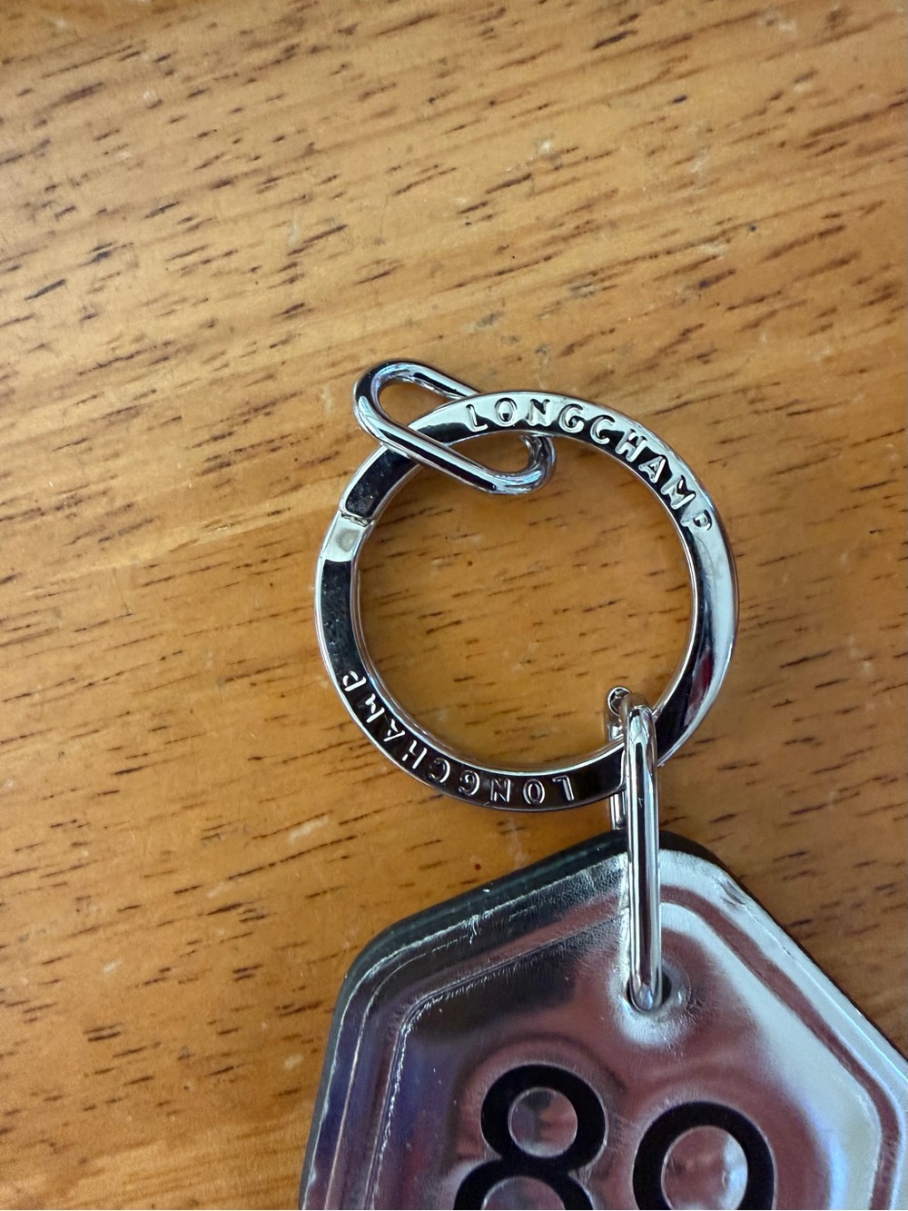 Longchamp Silver Key Tag Keychain with '89' Number - Picture 8 of 10
